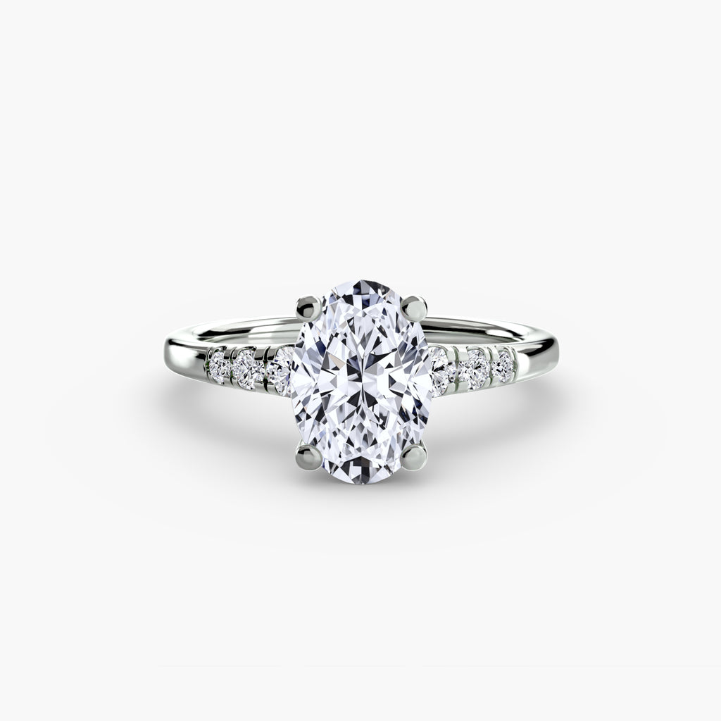 Descending Round Diamond Side Stone Ring